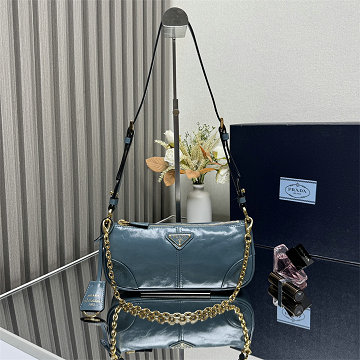 商品細詳を見る:プラダ PRADA GH-PD1BC221LNL 2025年新作 ミディアム レザー ショルダーバッグ ホーボーバッグ レディース